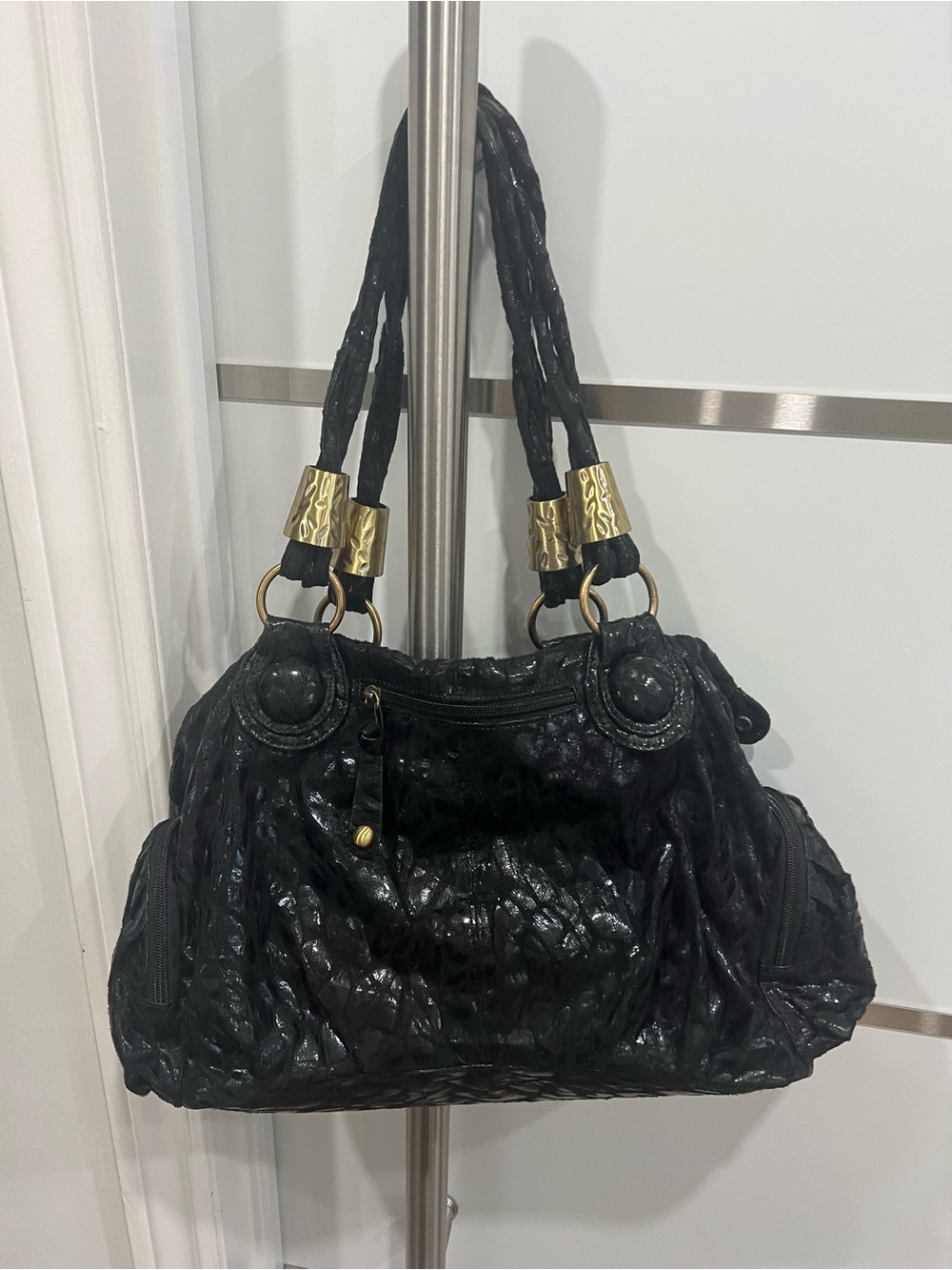 Elegant Black Braided Shoulder Bag with Gold Accents